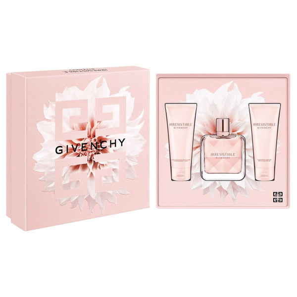 Givenchy perfume set with pink packaging and floral design on a white background